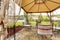 Backyard gazebo with antique chairs