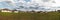 Backyard Panorama of low level stratus clouds moving over a urban community