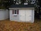 backyard shed in autumn