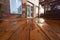 Backyard wooden deck floor boards with fresh brown stain