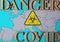 Bacterial danger sign on the map of Europe. danger covid lettering in wooden letters. coronavirus covid19