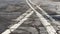 Bad asphalt road with markings close-up. Transport highway for movement. AI generated.