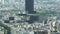 Bad digital glitch signal over tilt-up Parisian cityscape with multiple houses