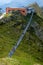 BAD GASTEIN, AUSTRIA - AUGUST 06, 2018: People cross a suspension bridge on the Stubnerkogel, Gastein mountains, Austria, Europe.