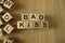 Bad kiss text from wooden blocks