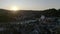 Bad Toelz Bavarian Oberland Germany. Sunset Aerial flight. Isar River and old city in the back