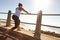 The only bad workout is the one that didnt happen. A young female runner stretching her muscles before a training