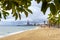 Badalona beach, city near Barcelona, Spain. Three chimneys of the thermal power plant