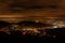 Baden-Baden night. Sparkling aerial view of downtown . Illuminated buildings and deep blue sky.