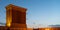 A badgir, wind catching tower in Yazd during evening after sunset, Yazd, Iran