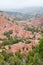 Badlands and conifer forest in High Atlas, mount Toubkal area