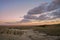 Badlands meet South Dakota prairie at sunrise
