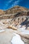 The badlands near Drumheller, Alberta are famous for rich deposi