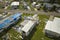 Badly damaged mobile homes after hurricane Ian in Florida residential area. Consequences of natural disaster