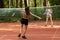 Badminton outdoor, two girls play in the park in nature, sports and recreation