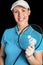 Badminton player holding badminton racket and shuttlecock