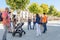 Baeza, Jaen, Spain - June 20, 2020: A group of unknown tourists with a professional tourist guide visiting the old city of Baeza