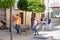 Baeza, Jaen, Spain - June 20, 2020: A group of unknown tourists with a professional tourist guide visiting the old city of Baeza