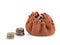 Bag of clay with moneÑƒ and column of coins isolated on a white background. Investment or growth concept