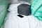 Bag fabric black and cell phone on white bed in Interior train with copy space add text