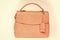 Bag or handbag of coral color, leather material