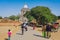 BAGAN, MYANMAR - JANUARY 21: 2019.Unidnetified people come to visit and make merit at Thatbyinnyu temple Majestic pagoda towering