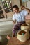 BAGAN, MYANMAR- SEPTEMBER 12, 2016: Burmese people making lacquerware dishes at a local factory in Old Bagan