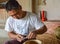 BAGAN, MYANMAR- SEPTEMBER 12, 2016: Burmese people making lacquerware dishes at a local factory in Old Bagan