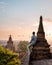 Bagan Myanmar young men watching Sunrise from the roof top of an ancient temple, man sunset roof pagoda temple Bagan