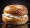 Bagel with cream cheese and sesame seeds on a dark background, AI
