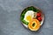 Bagel with egg and vegetables