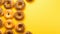 Bagel Flatlay: Aesthetic Arrangement Of Bagels On Yellow Background