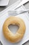 Bagel with a heart-shaped hole
