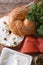Bagel and ingredients: fish, cheese, capers vertical top view