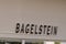 Bagelstein fast food restaurant text and logo sign facade pick-up delivery bread