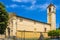 Bagnoregio, Italy - Annunciation Church and Saint Augustin statue in historic center of old town quarter at Piazza Santâ€™Agostino