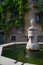 Bagolino medieval village, public water fountain in the central square