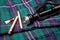 Bagpipe reeds on tartan