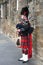 Bagpiper in Traditional Uniform on the Royal Mile, Edinburgh, Scotland, Great Britain