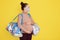 Bags of baby clothes, stuff, pregnant woman being ready for going to maternity hospital, lady wearing casual clothing and medical