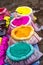 Bags of colored powdered paint sit waiting to be sold to Holi Festival celebrants