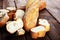 Baguette baked bread and sliced baguette on background