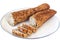 Baguette Integral Bread Cut In Slices On White Plate - Isolated