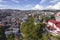 Baguio City, Philippines - Afternoon aerial of the skyline of the city extending up to the hills