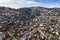Baguio City, Philippines - Afternoon aerial of the skyline of the city extending up to the hills