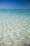 Bahamas Beach Scene with Crystal-Clear Water and Sand Ripples