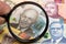 Bahamian dollars - new serie in a magnifying glass