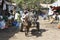 Bahir Dar, Ethiopia, February 14 2015: An old couple drives their donkey carriage through a market