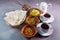 Bahrain Breakfast with hummus, beans, bread, coffee served in dish isolated on grey background top view of bahrain food