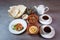 Bahrain Breakfast with hummus, beans, bread, coffee served in dish isolated on grey background top view of bahrain food